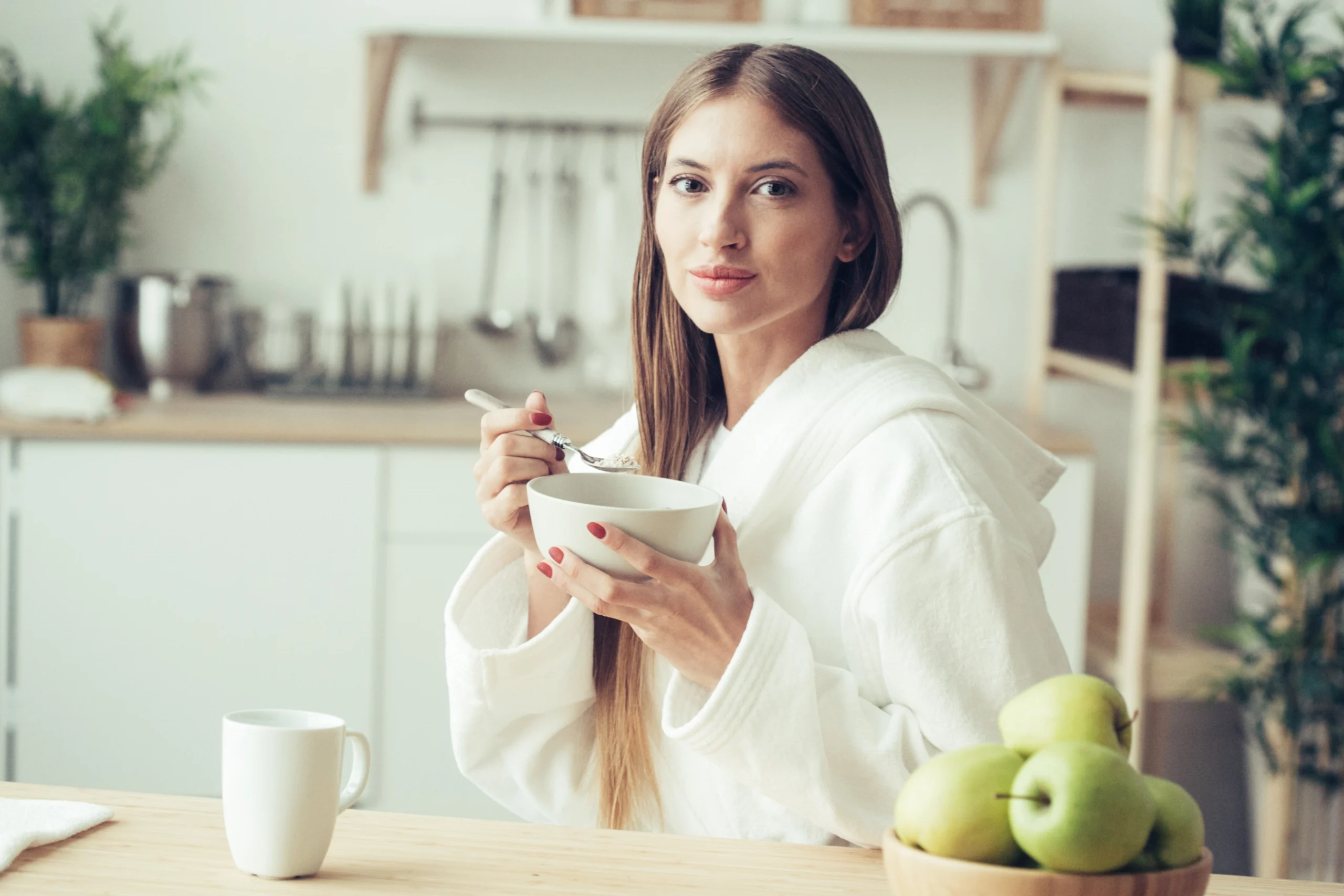 Caroline Hayes | A quiet moment in the kitchen Caroline Hayes, author of Recipes To Keep, enjoys a quiet morning with a bowl of oatmeal in her bright, welcoming kitchen.