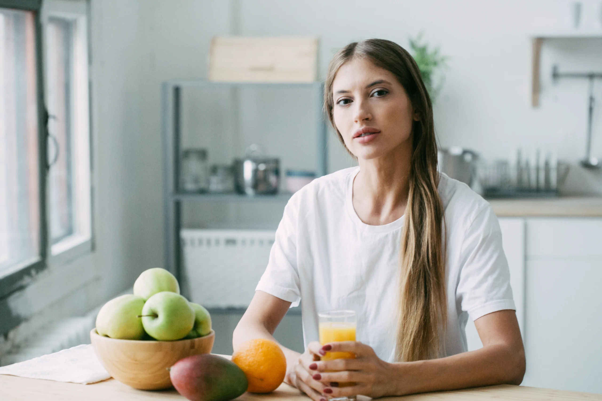 Caroline Hayes, Founder of Recipes To Keep Caroline Hayes, founder of Recipes To Keep, sits at her kitchen table with a glass of orange juice and a bowl of fresh fruit.